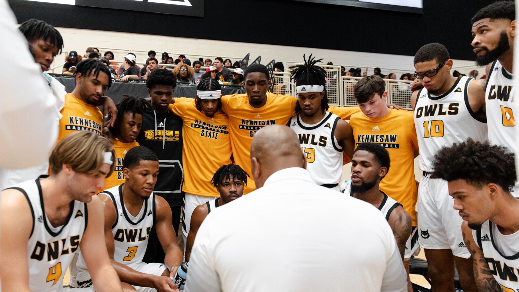 Team huddle with Amir